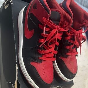 Jordan 1 Mid Nike Black and Red High-Top Sneakers